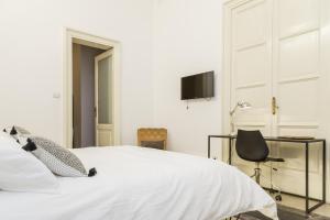 Postel nebo postele na pokoji v ubytování B&B 4 ELEMENTI CATANIA
