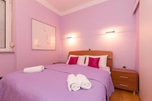 Postel nebo postele na pokoji v ubytování Apartment Arcadia