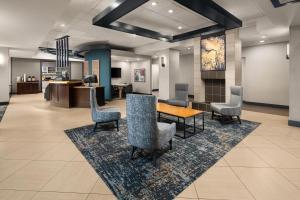 an office lobby with a table and chairs at Hyatt Place Richmond - Innsbrook in Short Pump +47 photos