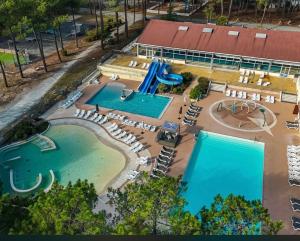 an aerial view of a pool at a resort at Euronat naturist studio in Grayan-et-lʼHôpital