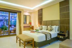 Postel nebo postele na pokoji v ubytování d'Penjor Seminyak + 33 fotografií