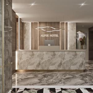 a lobby with ayx hotel sign on the wall at Alpek Hotel Antalya - Lara in Antalya +40 photos