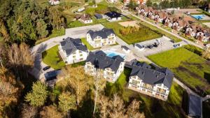 an aerial view of a large estate with houses at Wydmowa Ostoja in Żarnowska