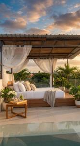 a bedroom with a canopy bed and a pool at 20 off Special Brilliant Location in Seminyak