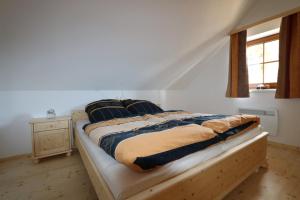 Postel nebo postele na pokoji v ubytování Hüttentraum Flattnitz