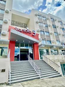 a building with stairs in front of a building at Atelier Studio, Stanford Suites 3, Silang in Silang