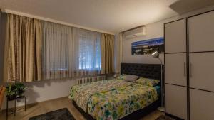 מיטה או מיטות בחדר ב-Lake Side Apartments by ZagrebRent