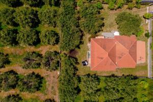 an overhead view of a house with a red roof at Emerald Cove in Kanali +23 photos