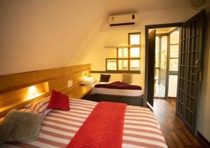 a bedroom with two beds in a room at Poomala Holiday Village in Mulagunnathukāvu