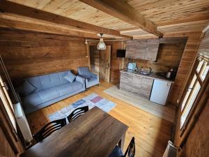 an overhead view of a living room with a table and a kitchen at HEVAS Suite in Ayder Yaylasi