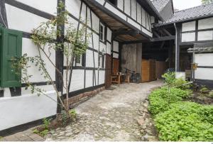 a courtyard of an old building with a bike parked at BeiArnold in Schleiden