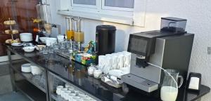 a drink laboratory with a machine on a glass counter at Palisander z widokiem na morze in Trzęsacz