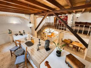 an overhead view of a living room with a table and chairs at Venetian Palace Chania - Adults Only in Chania