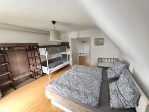 a bedroom with a bed in a attic at Ferienwohnung Paul & Jakob in Nohfelden