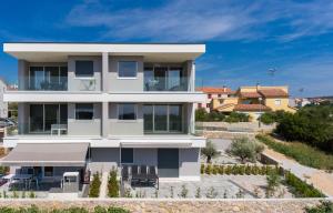 an image of a white house at Apartment Marinela in Krk