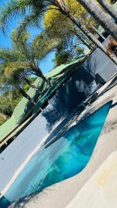 a skate park with a pool of blue water at Nvivi boutique hotel in Polokwane