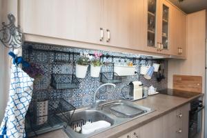 Kuchyň nebo kuchyňský kout v ubytování Apartment Corinth
