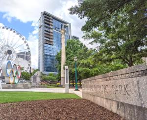 a park with a ferris wheel in the background at Atlanta Resort 1BR Apartment in Atlanta