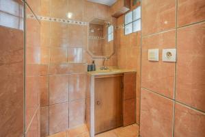 a bathroom with a shower and a sink at Boni in Saint-Julien-Molin-Molette