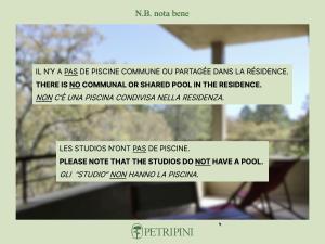 a screenshot of a website with a picture of a house at Hameau de Petripini in Sotta