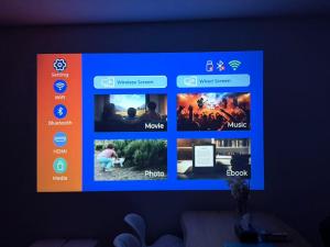 a television screen with differentvideos and apps on it at クリスタルSky tree Hotel in Tokyo