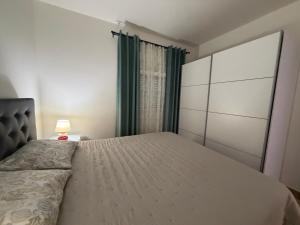 a bedroom with a large bed and a window at Villa Luna Maris in Starigrad +36 photos