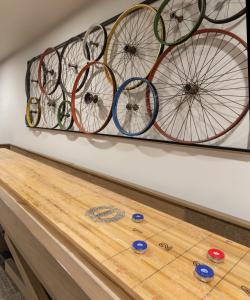 a group of bikes hanging on a wall at Austin Resort 2BR Apartment in Austin +57 photos