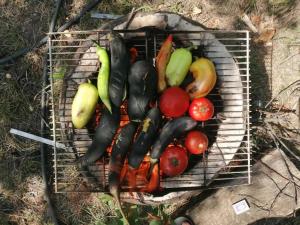 a bunch of vegetables sitting on a grill at UNO-Dili Hotel includes free pick up and drop off in Dilijan