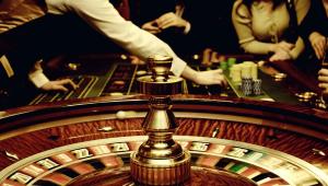 a man playing roulette in a casino at Alma Motel in Alma