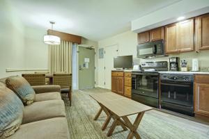 a living room with a couch and a table at Durango Resort 1BR Apartment in Durango