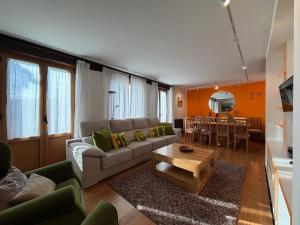 a living room with a couch and a table at Cortea I y II in Añézcar