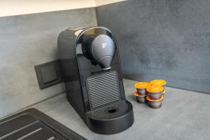 a computer generated image of a coffee machine at Eifel Comfort Luxury Spa Suite mit privatem Whirlpool & Sauna in Pronsfeld