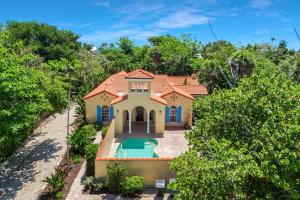 an aerial view of a house with a swimming pool at Villa Elena in Captiva