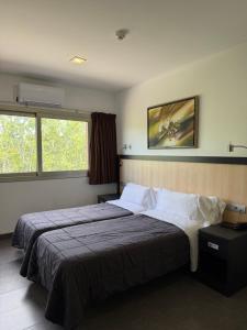 Llit o llits en una habitació de Hotel 170