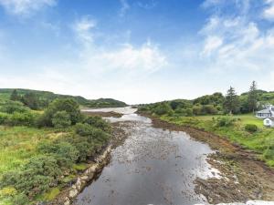 an aerial view of a river in a field at Tigh Na Clachan in Clachan +17 photos