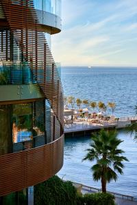 a view of a resort with the ocean in the background at Princes' Palace Resort, Buyukada - Member of The Leading Hotels of the World in Adalar +60 photos