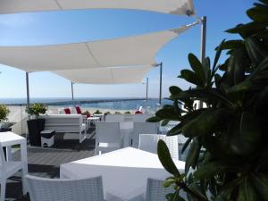 Photo de la galerie de l'établissement House Barra Beach, à Praia da Barra