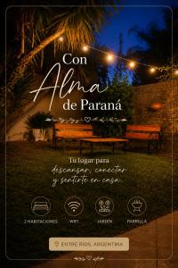 a sign for a park with a bench and lights at Con alma de Paraná, patio y estacionamiento propio in Paraná