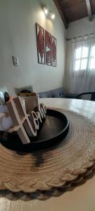a group of shoes sitting on a table at Con alma de Paraná, patio y estacionamiento propio in Paraná +27 photos