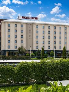 a building with a sign on top of it at Laodikya Hotel in Denizli