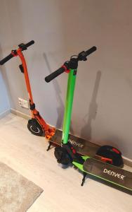 two scooters are sitting on the floor at Sorvarinraitin Helmi in Seinäjoki +3 photos