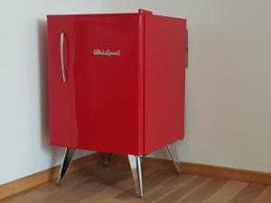 a red refrigerator with the words walmart on it at Apartamento Reyes Catolicos in Salta