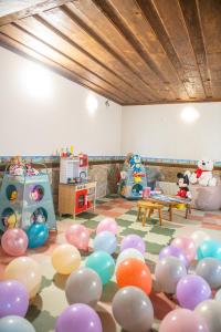 a room with a bunch of balloons on the floor at Хотелски комплекс Усоето in Elena +147 photos
