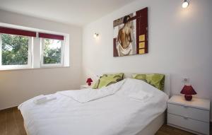 Posteľ alebo postele v izbe v ubytovaní Apartman Prima