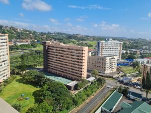 an aerial view of a city with tall buildings at Apartment on doonside Beach in Kingsborough