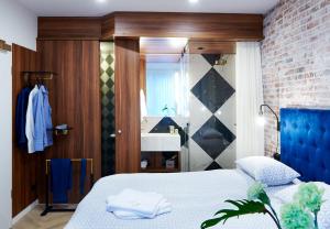 Postel nebo postele na pokoji v ubytování Five Rooms