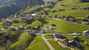 an aerial view of a small village on a hill at Großes Bergapartment 4 SZ Balkon & Aussicht in Sonntag +41 photos