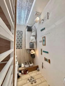 a staircase in a house with a room with a stair case at Home Sereia in Trebisacce