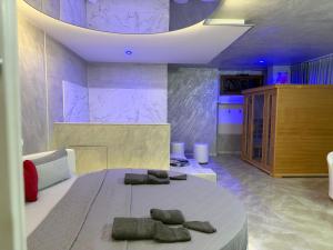 a bedroom with a bed with two pillows on it at B&B Luxury Room e Spa in Apricena