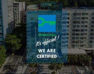 a sign that says green key its official we are certified at Arena Leme Hotel in Rio de Janeiro